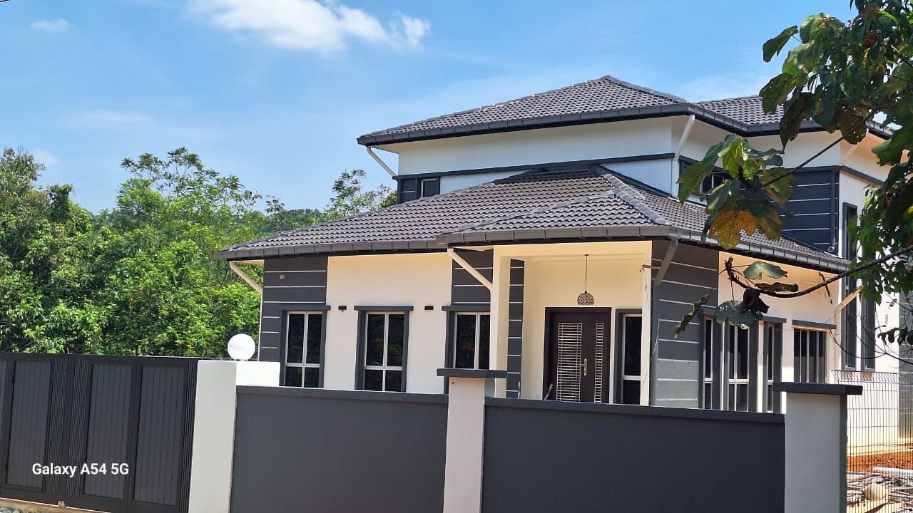 Charcoal and white two-storey bungalow